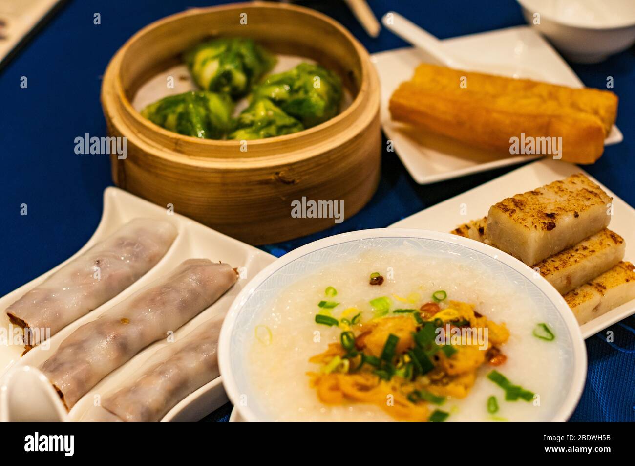 Dim sum on a table in Meixin Garden (Jade Garden) restaurant Guangzhou Stock Photo