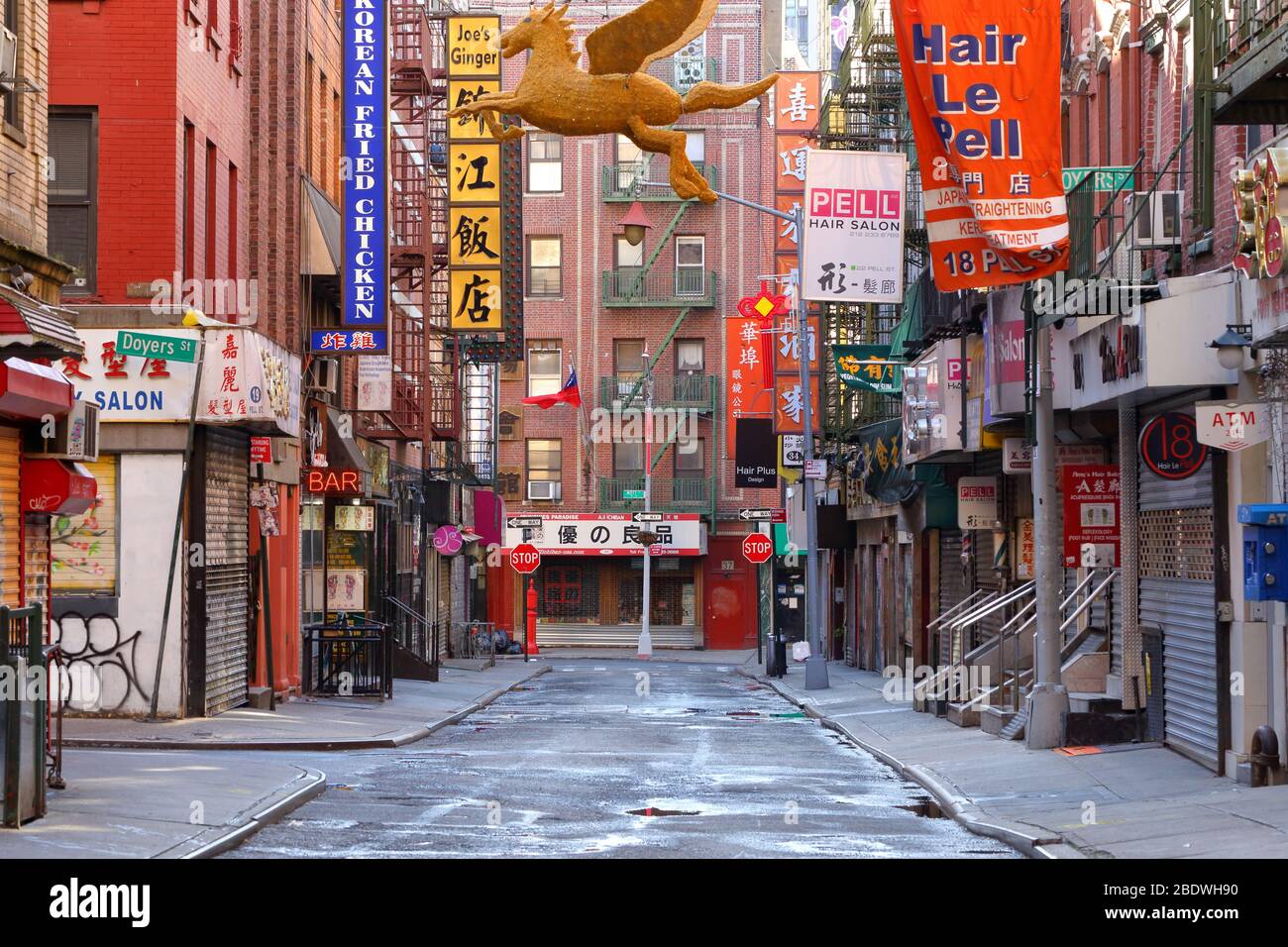 New York, NY, 9th April 2020, 17h00. Shuttered storefronts along Pell Street in the heart of Manhattan Chinatown... SEE MORE INFO FOR FULL CAPTION. Stock Photo