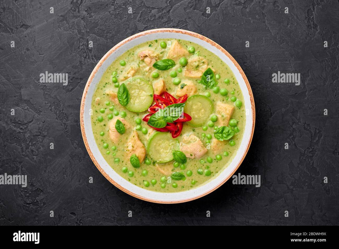 Thai Green Curry with Chicken or Gaeng Kaew Wan Gai in white bowl at ...