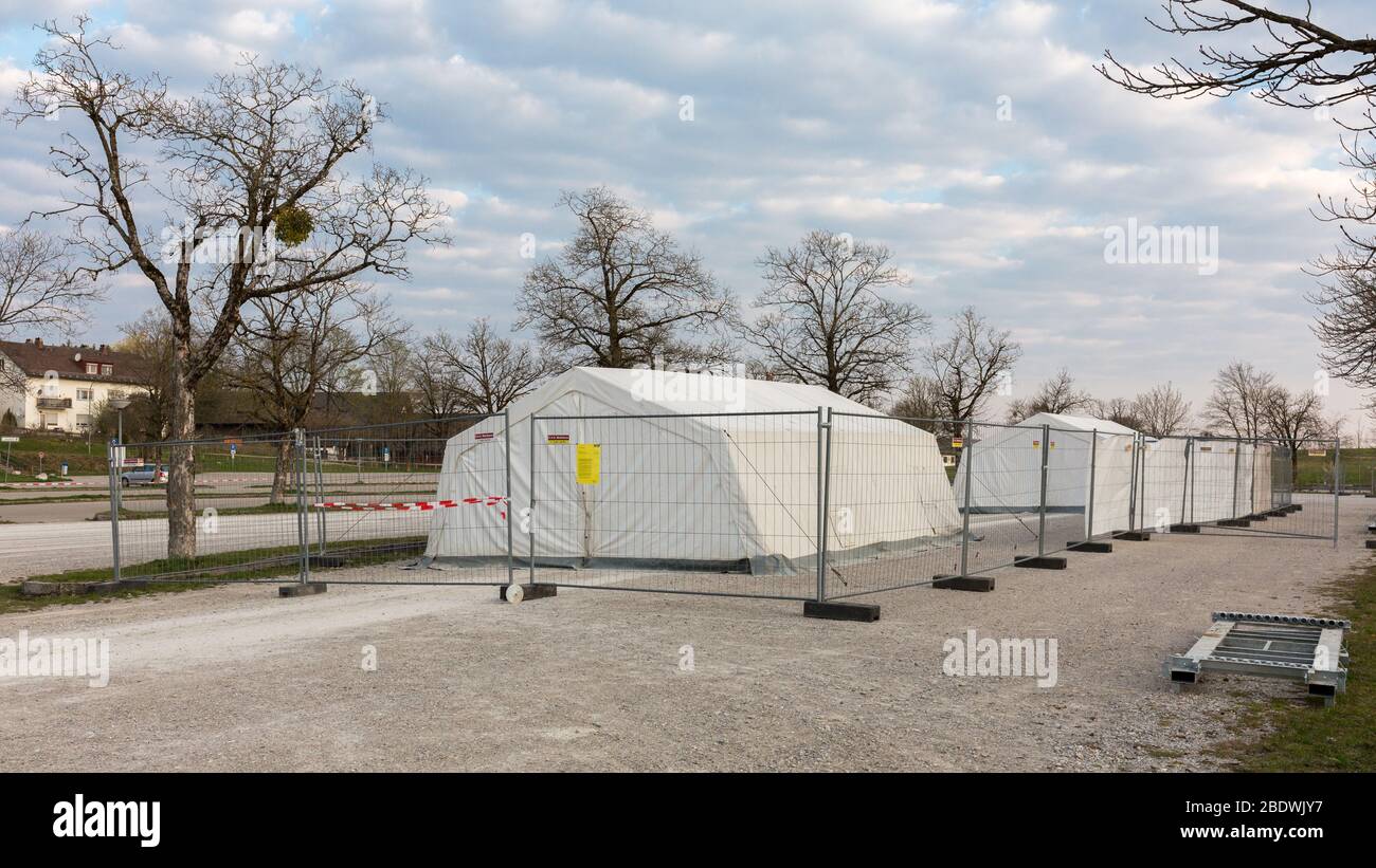 Coronavirus (Covid-19) Drive-In located at the parking space of Andechs abbey. The test station consists of two white tents. Stock Photo