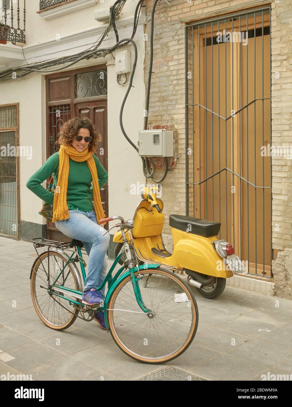 Pretty woman on bicycle hi res stock photography and images Alamy