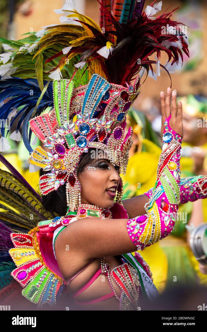 Female performer in multi-coloured costume at Notting Hill Carnival, London  Stock Photo - Alamy