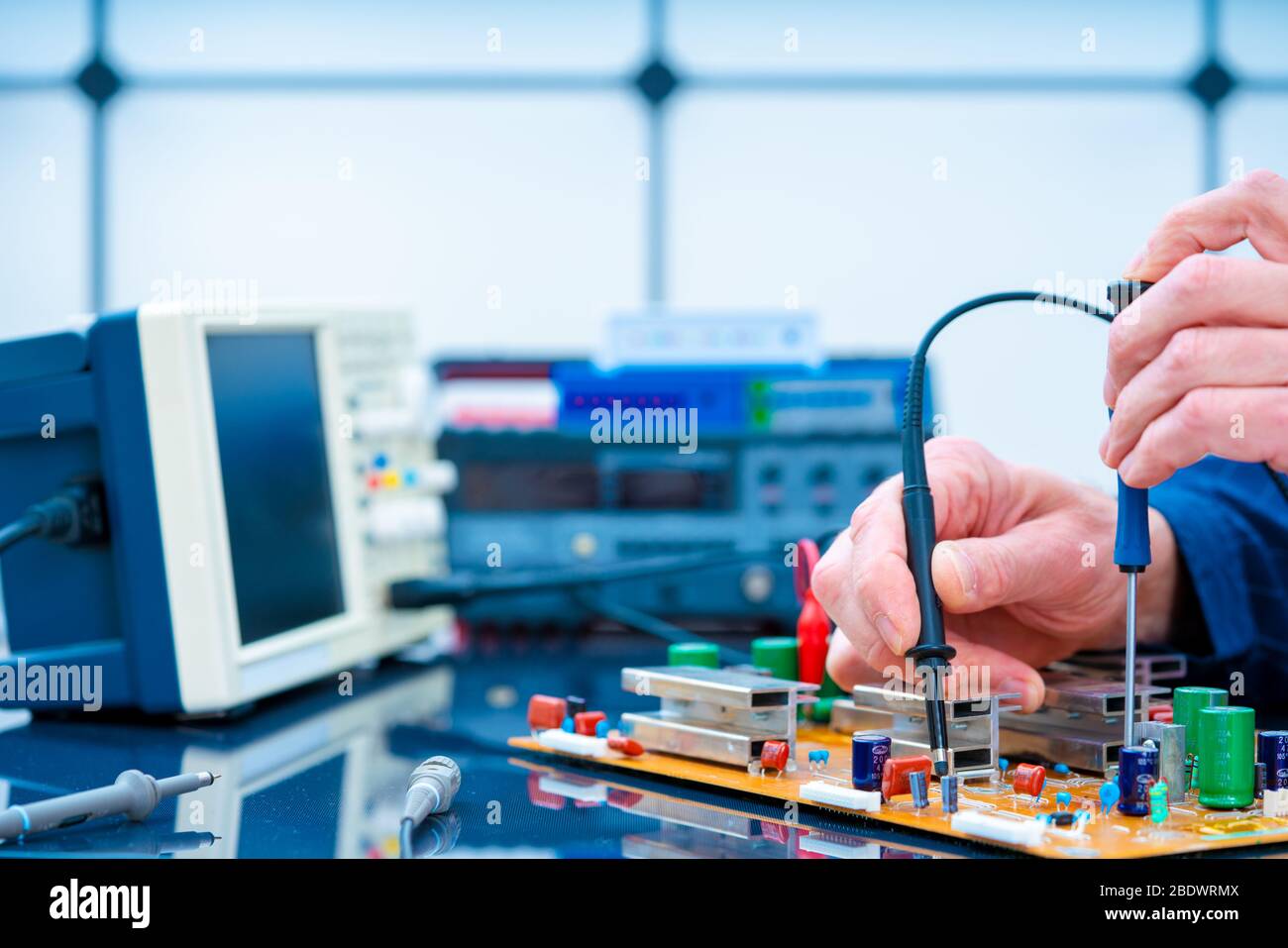PCB witch microcontroller in electronics laboratory Stock Photo