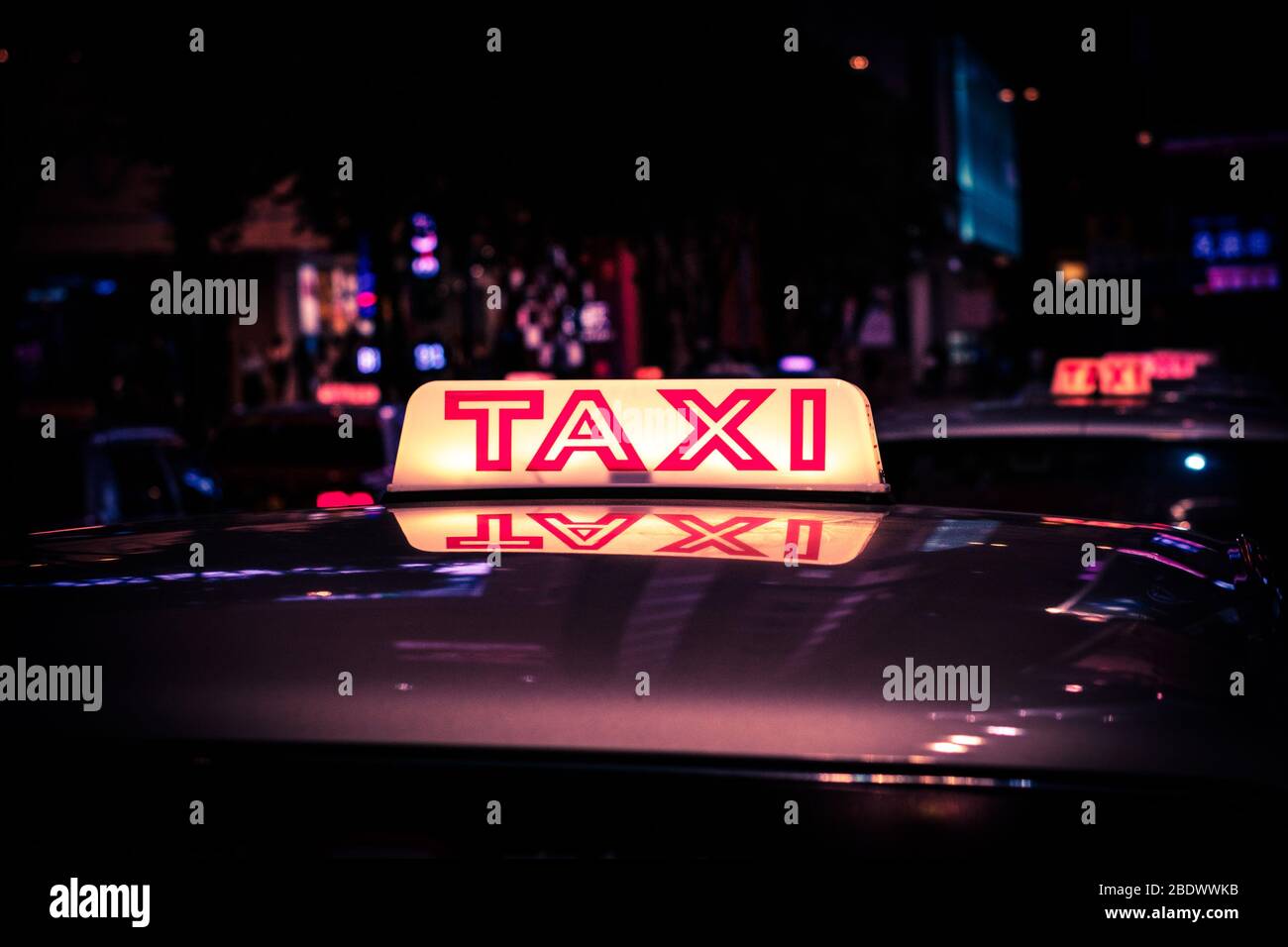 Hong Kong, November, 2019:  Taxi cab car    in Hong Kong at night Stock Photo