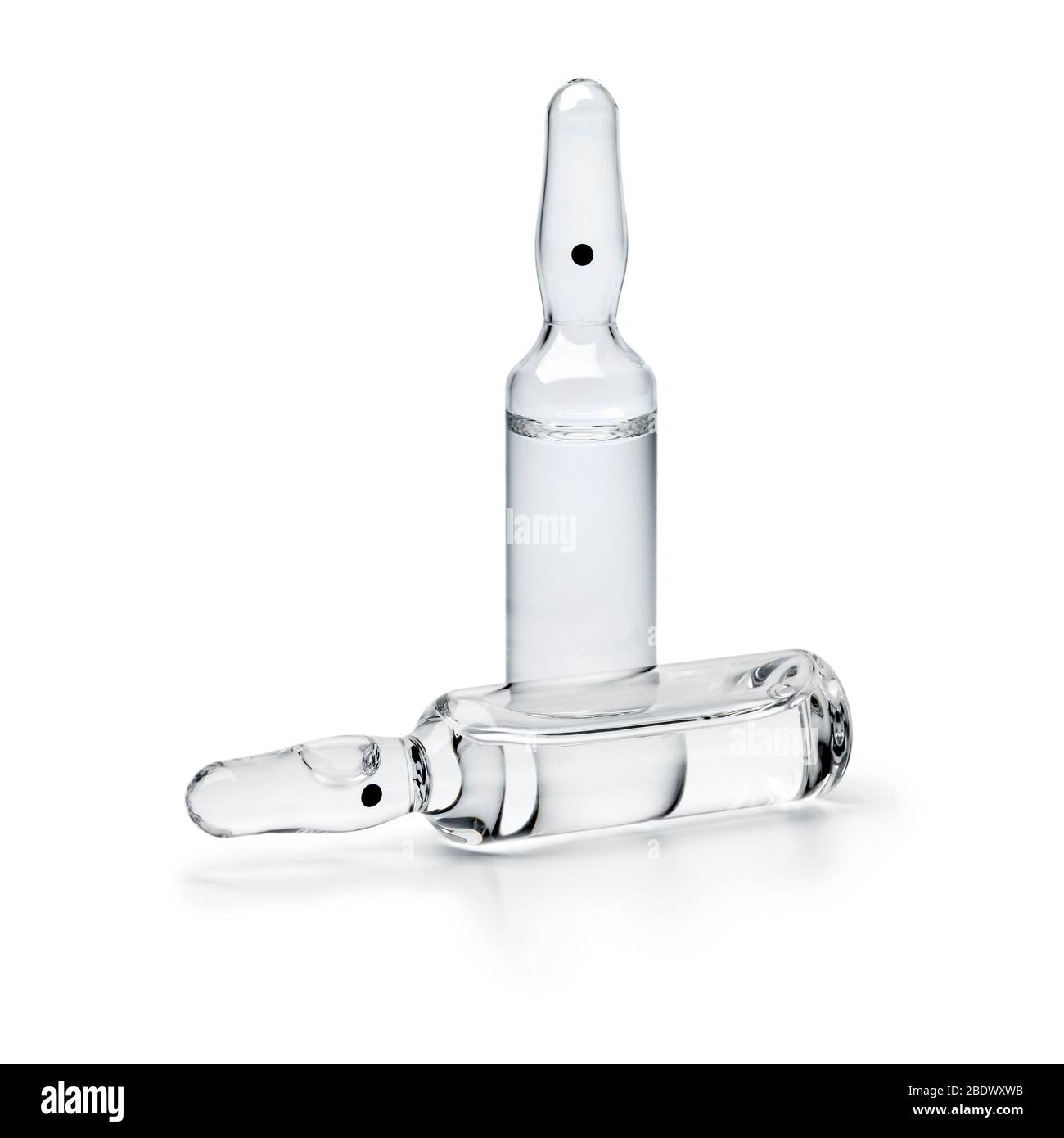 Pair of clear glass ampoules close up isolated on white background