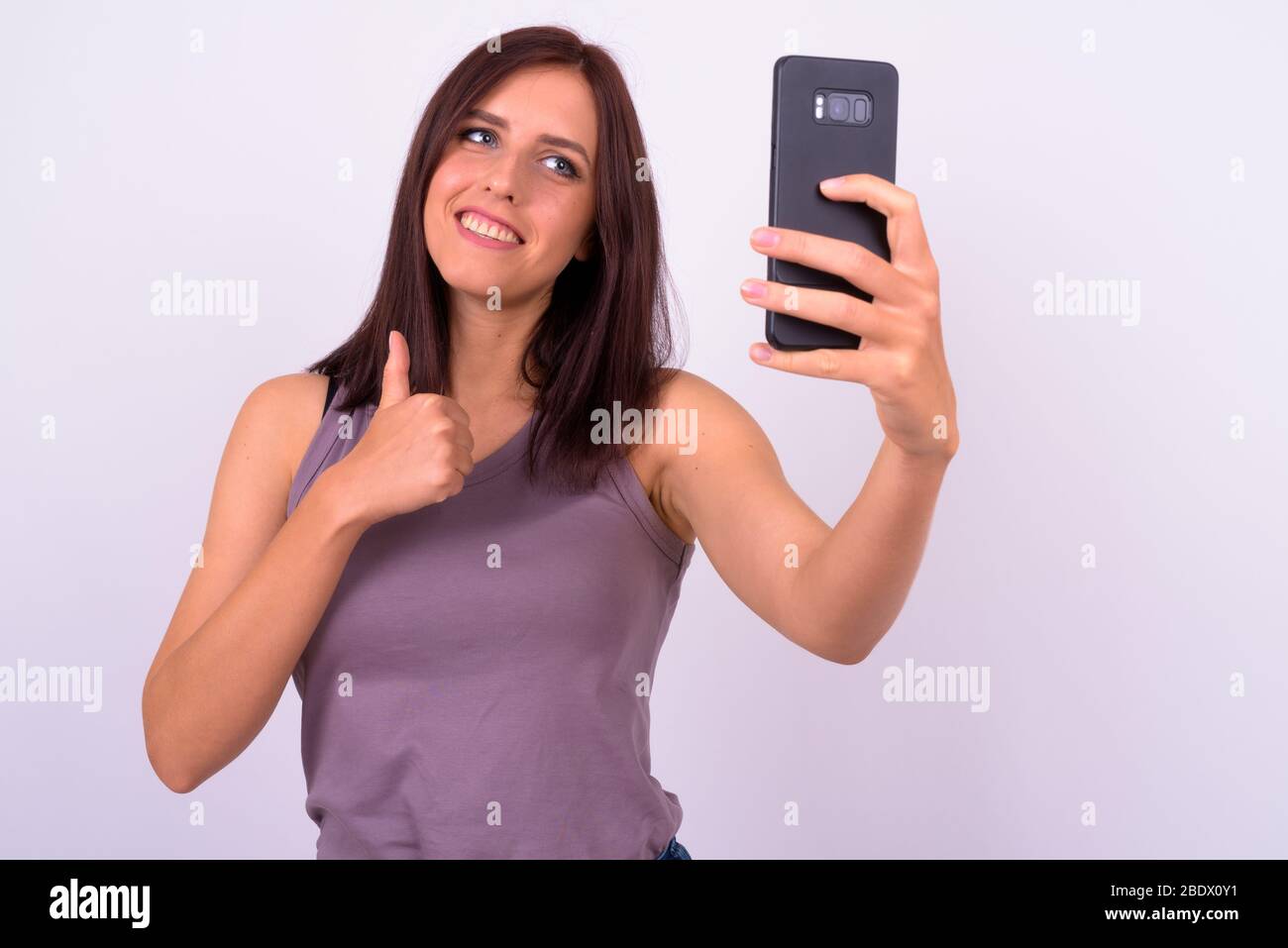 Happy young beautiful woman taking hi-res stock photography and images ...