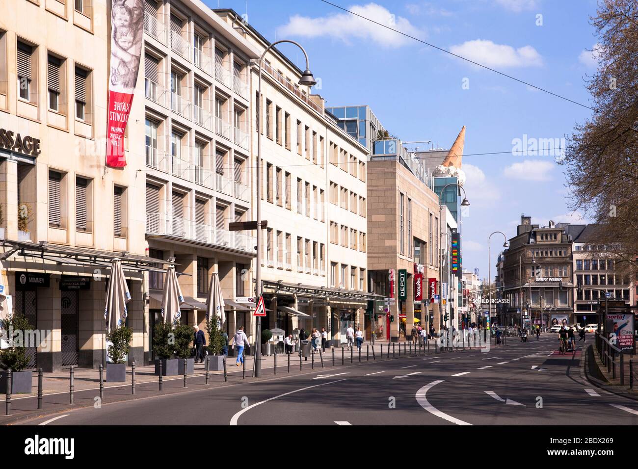 Coronavirus / Covid 19 outbreak, April 7th. 2020. Only few people and low traffic on Neumarkt, Cologne, Germany.  Coronavirus / Covid 19 Krise, 7. Apr Stock Photo
