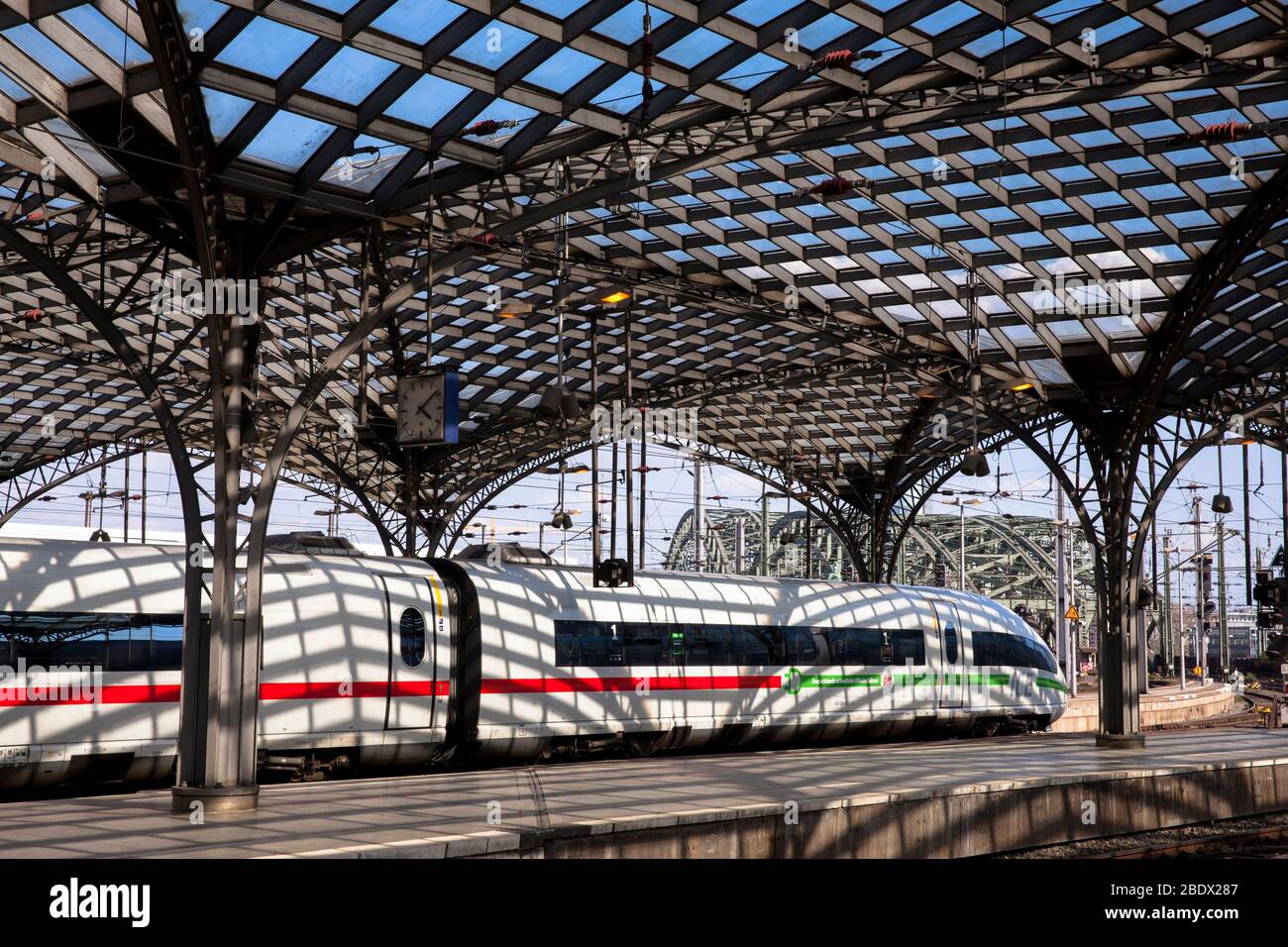 high-speed train Intercity Express ICE leaving the main station, Cologne, Germany.  Hochgeschwindigkeitszug Intercity Express ICE bei der Ausfahrt aus Stock Photo