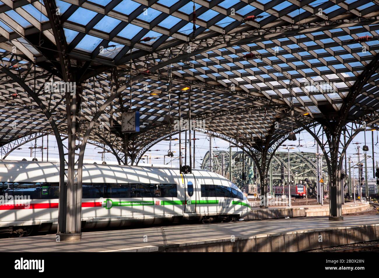 high-speed train Intercity Express ICE leaving the main station, Cologne, Germany.  Hochgeschwindigkeitszug Intercity Express ICE bei der Ausfahrt aus Stock Photo