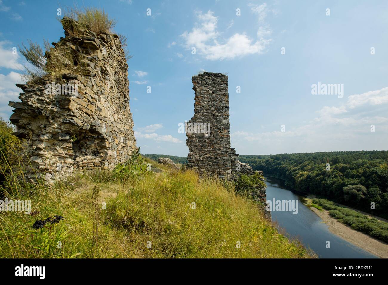 Ruins of Gubkiv (Hubkiv) castle on a Sluch river hills in summer near Gubkiv village, Rivne region, Ukraine. Travel destinations in Ukraine Stock Photo