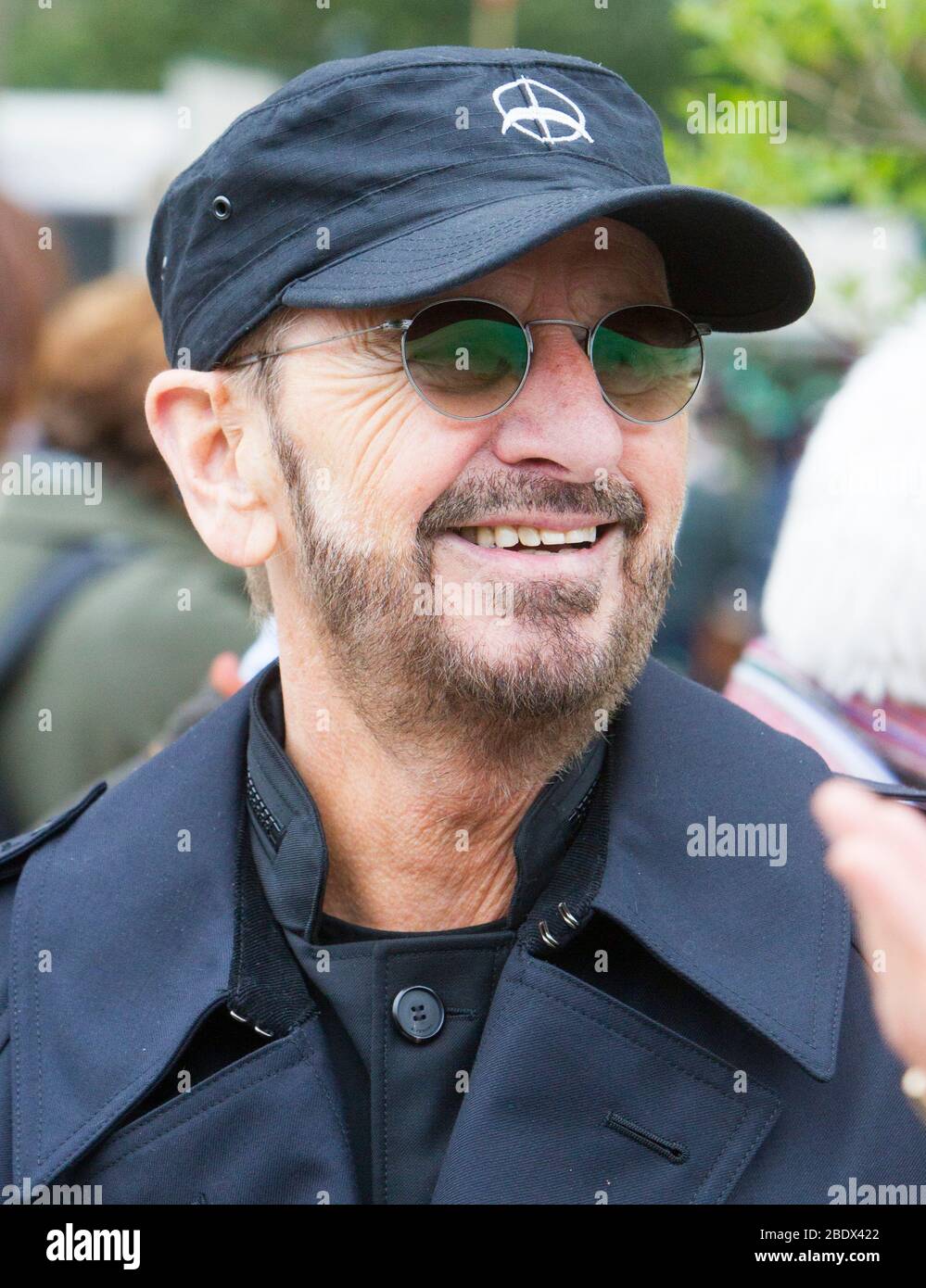 Drummer Ringo Starr, former member of The Beatles, at the Chelsea Flower Show. After the band's break-up in 1970, he released several  singles. Stock Photo