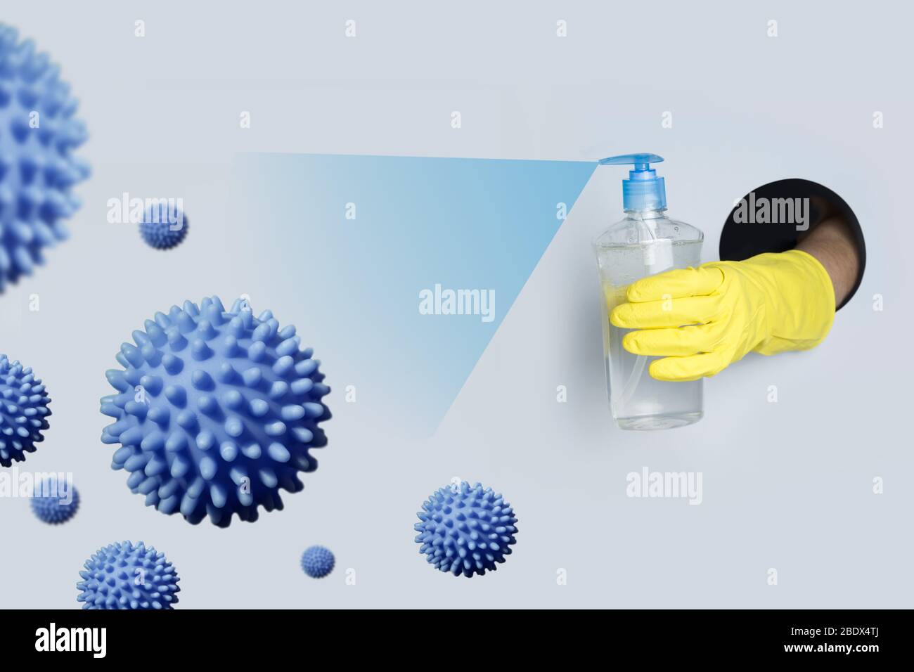 Woman in gloves disinfects virus special gel from paper hole. Protection against Coronavirus infection. COVID-19. Stock Photo