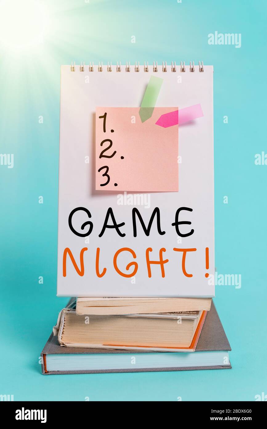 Conceptual hand writing showing Game Night. Concept meaning usually its  called on adult play dates like poker with friends Spiral notebook sticky  note Stock Photo - Alamy