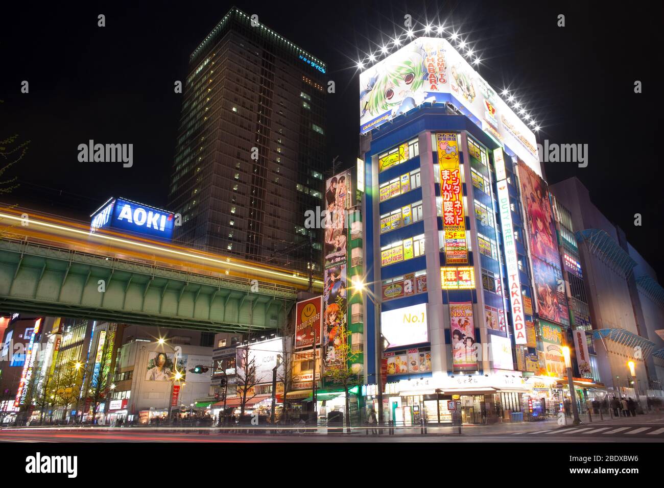 Akihabara Electric Town, Tokyo, Kanto Region, Honshu, Japan - Illuminated buildings full of advertising signs in a shopping district. Stock Photo