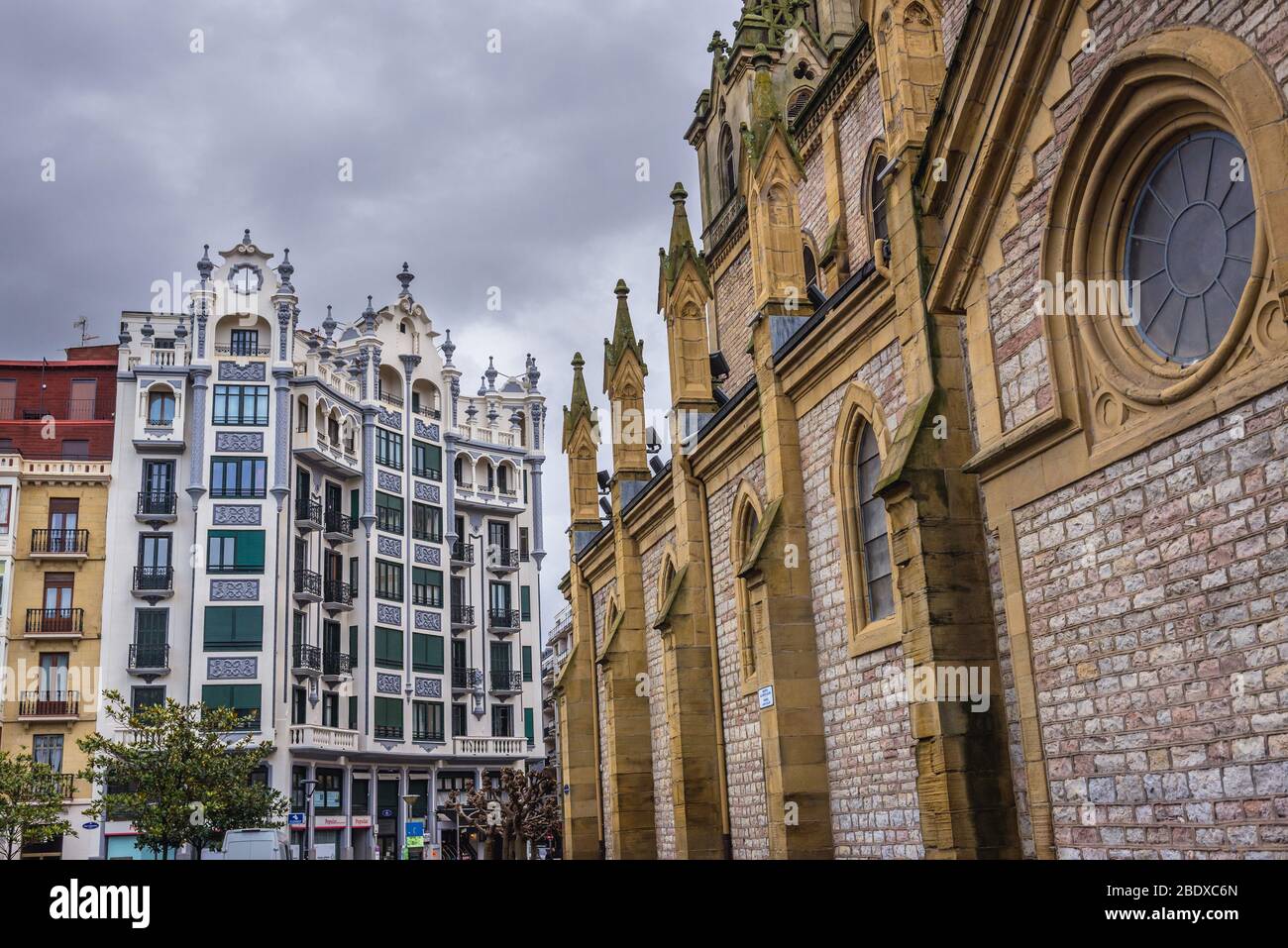 Side view of San Ignacio de Loyola and old residential budiling in San Sebastian coastal city located in Basque Autonomous Community, Spain Stock Photo