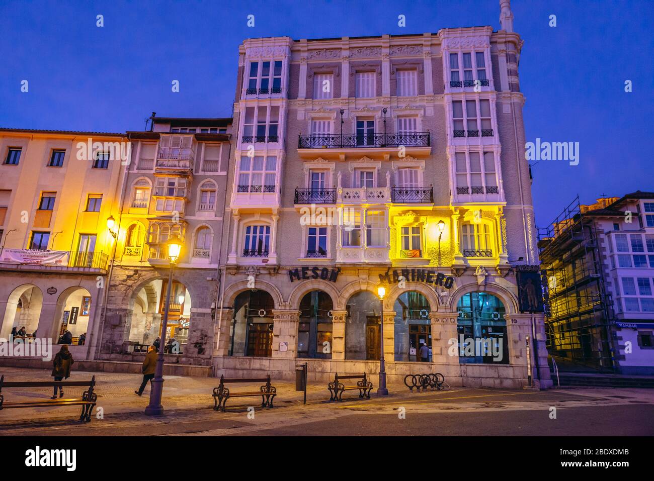 Historic building with Meson El Marinero restaurant on Plaza Ayuntamiento - Town Hall square in Castro Urdiales seaport in Cantabria region of Spain Stock Photo