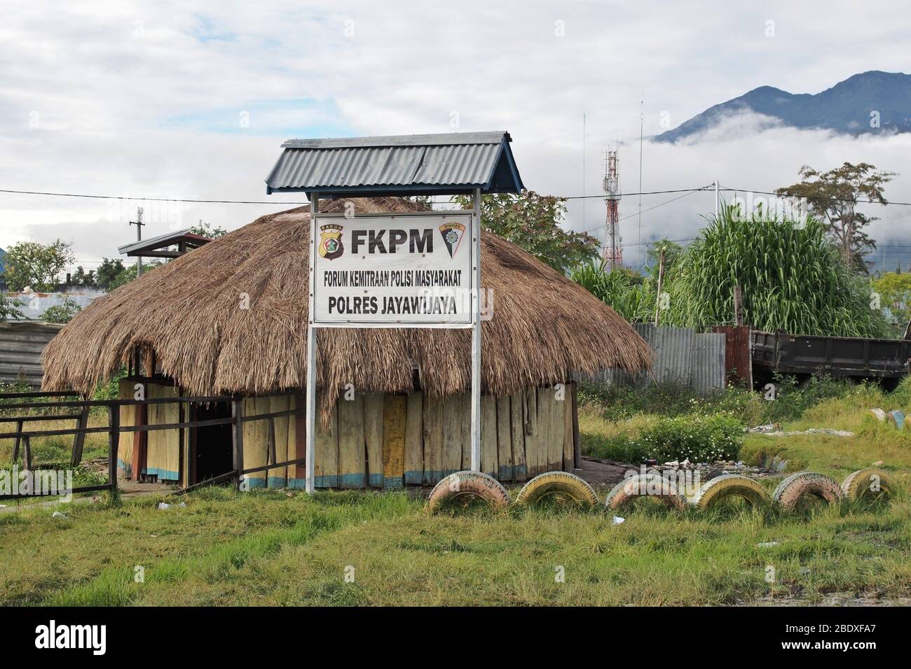 Police station in traditional honai hut, Baliem Valley, West Papua, Indonesia Stock Photo