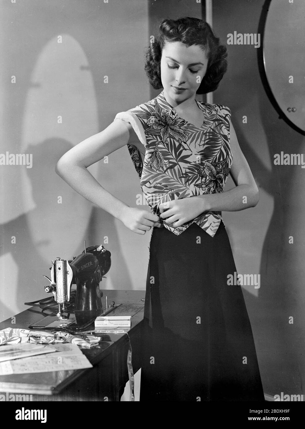Woman Making Dress, 1943 Stock Photo