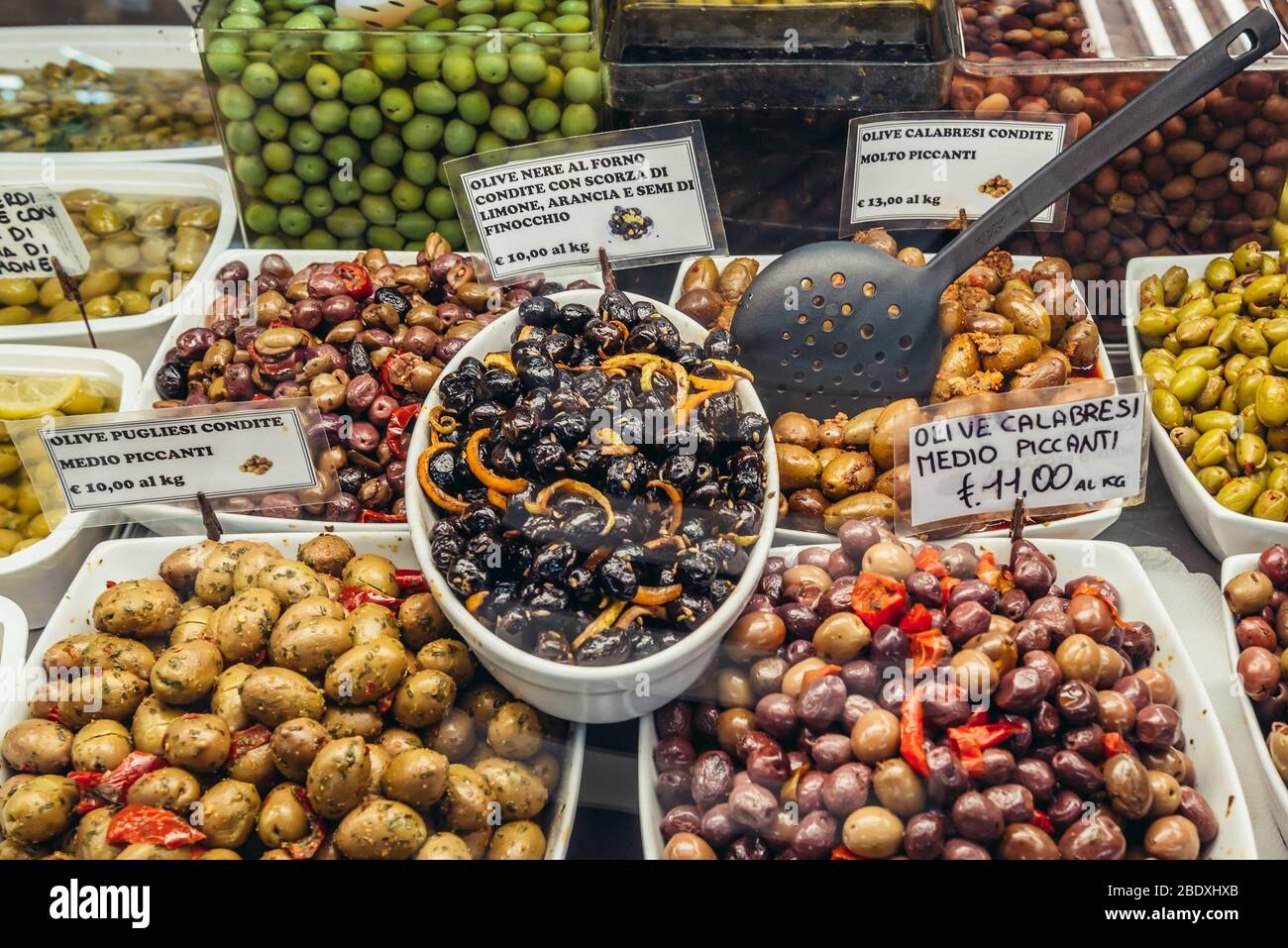 Olives for sale on Mercato Delle Erbe food market in Bologna, capital and  largest city of the Emilia Romagna region in Northern Italy Stock Photo -  Alamy