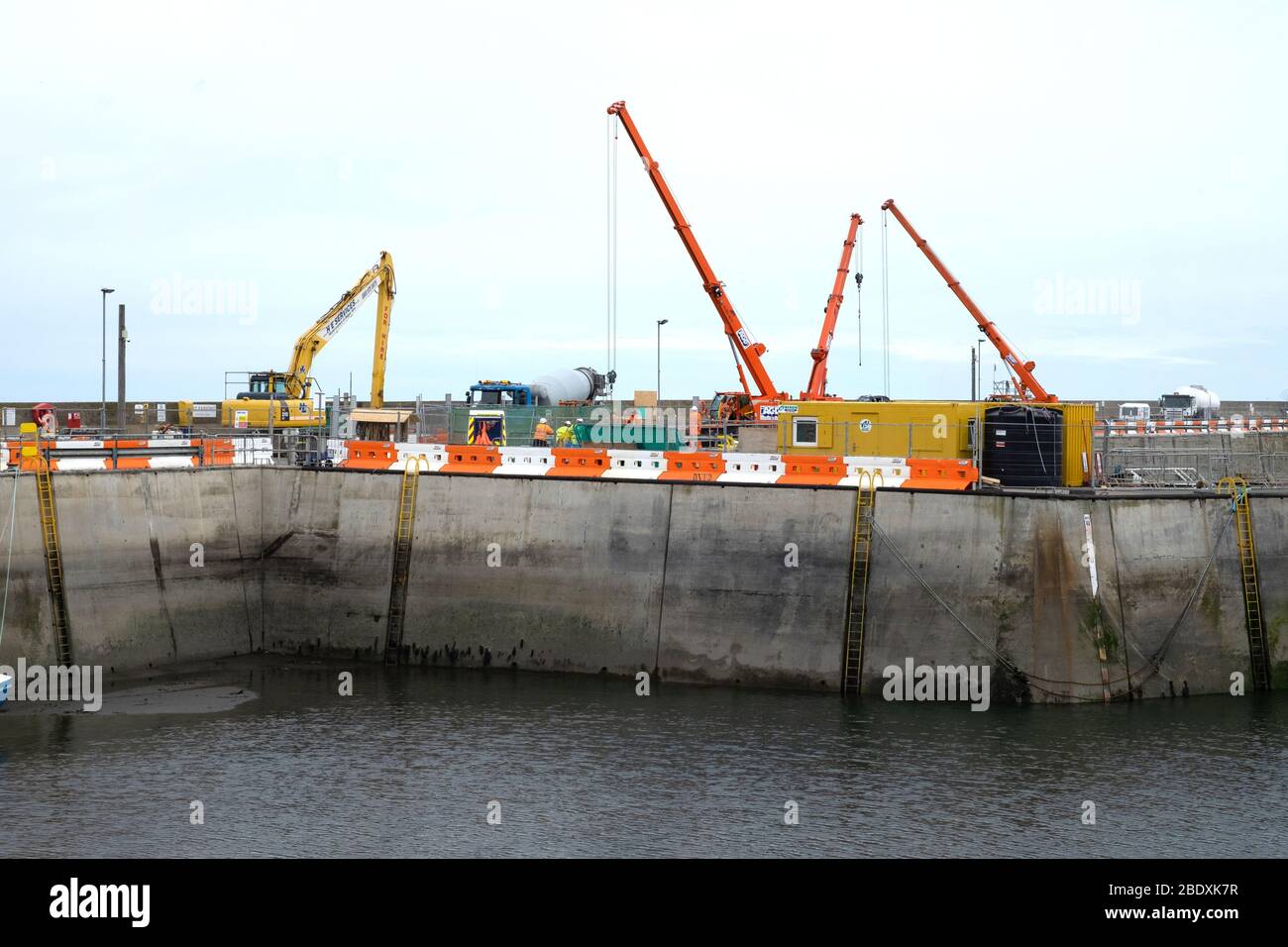 Refurbishment work at Seahouses harbour; Northumberland; England; Stock Photo