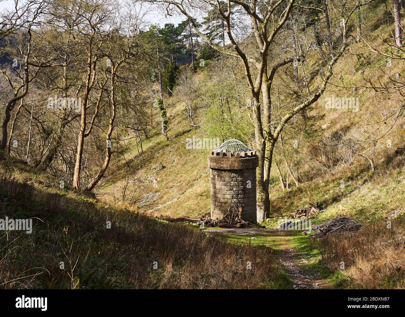 Railway tunnel ventilation shaft in The Gully  a dry limestone valley linking the Avon Gorge with The Downs in Bristol UK Stock Photo