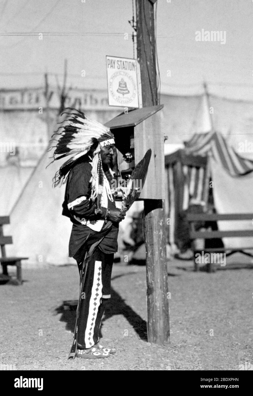 Wild west performer using telephone hires stock photography and images