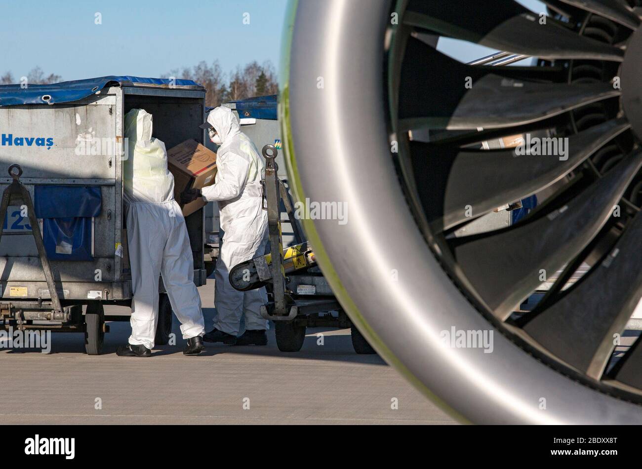 Riga, Riga. 10th Apr, 2020. Workers unload personal protection equipment (PPE) from China to help curb the spread of the novel coronavirus disease (COVID-19), in Riga, Latvia on April 10, 2020. Credit: Edijs Palens/Xinhua/Alamy Live News Stock Photo