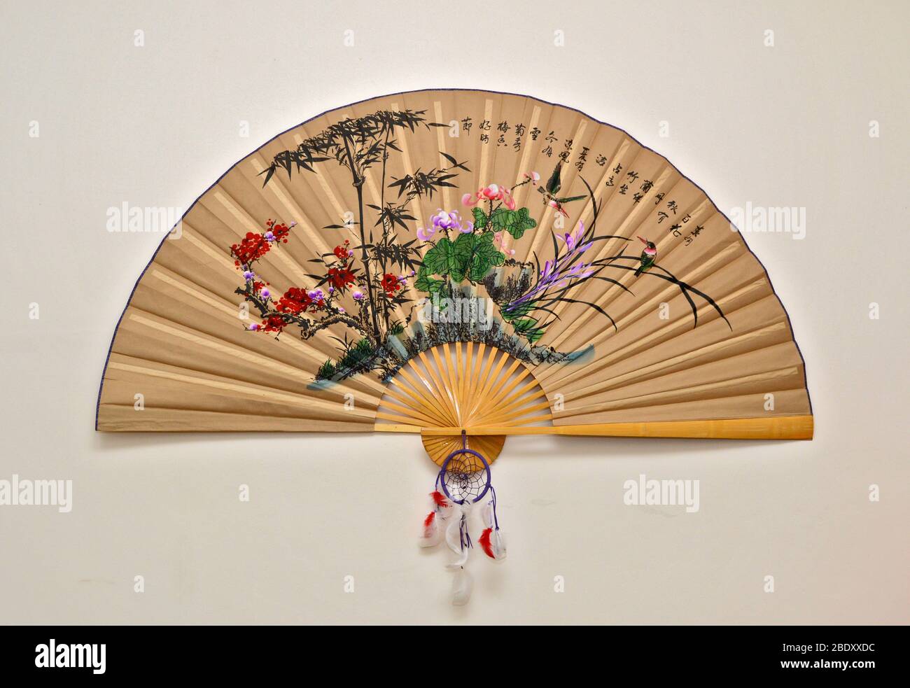 Open Oriental Fan Decorative Fan Placed On Wall With Light Colors