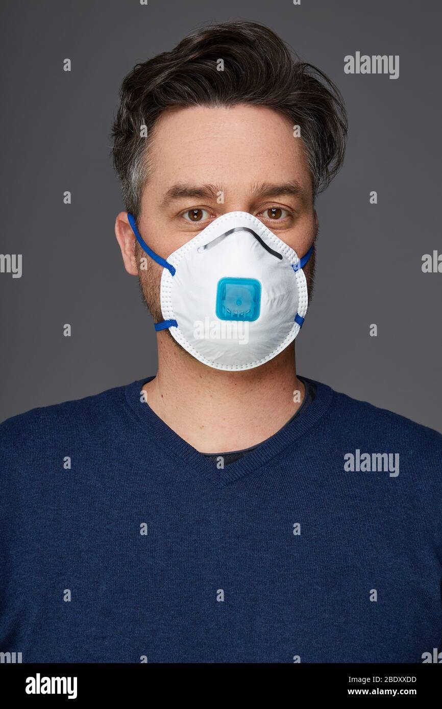 Man with a mask. Use mask properly Stock Photo Alamy
