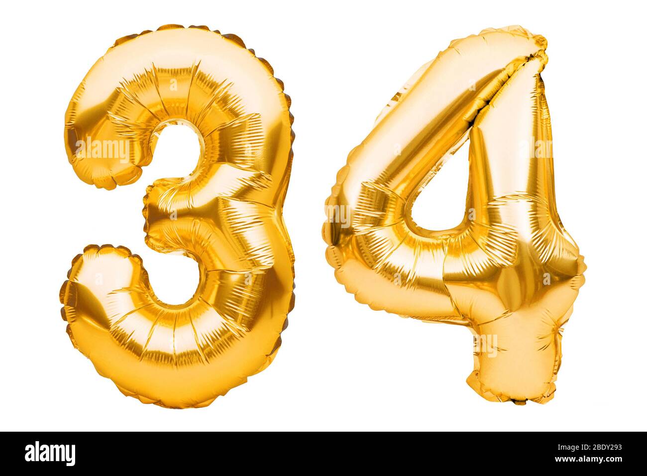 Number 34 thirty four made of golden inflatable balloons isolated on