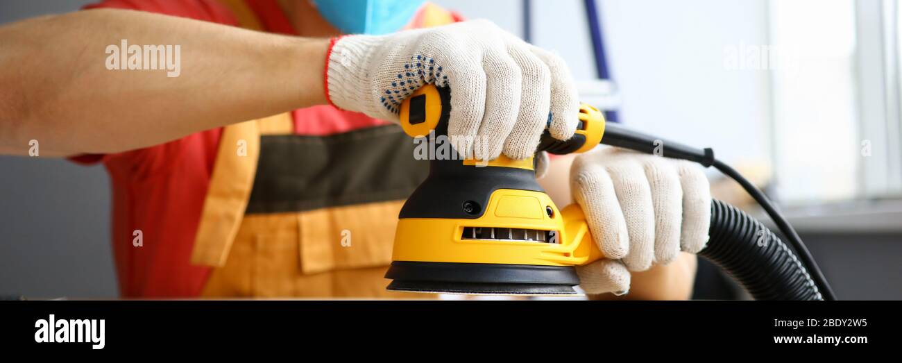 Concentrated man in face mask Stock Photo