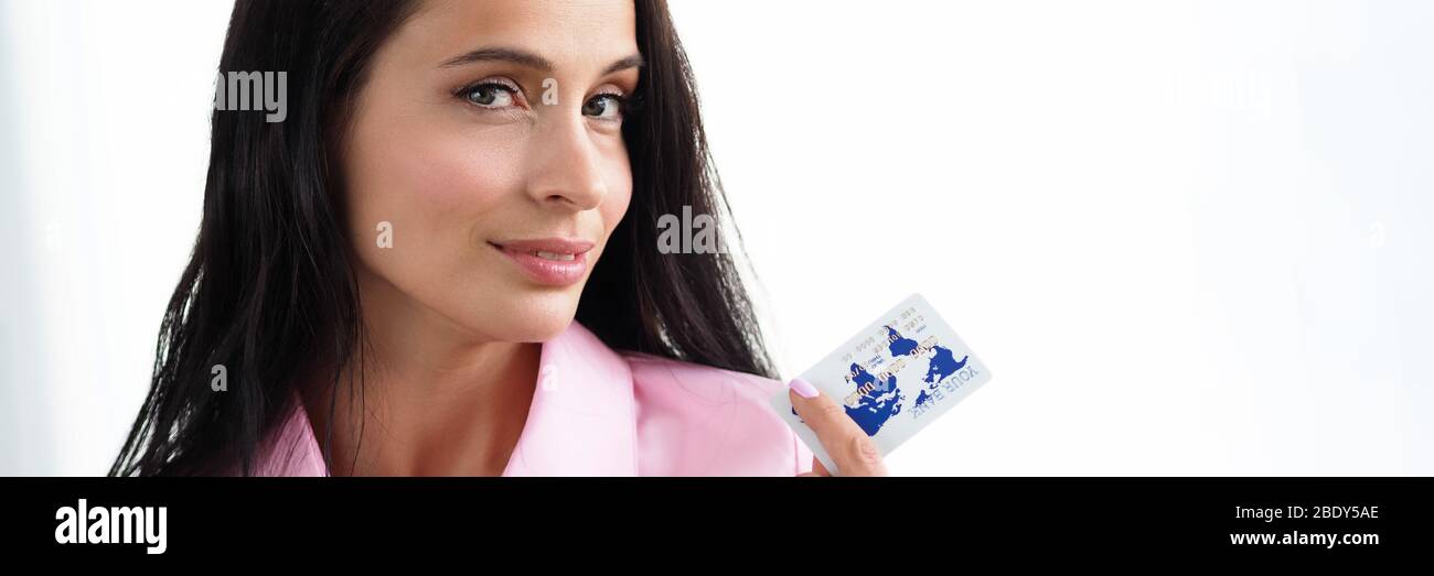 Woman paying for product by credit card Stock Photo