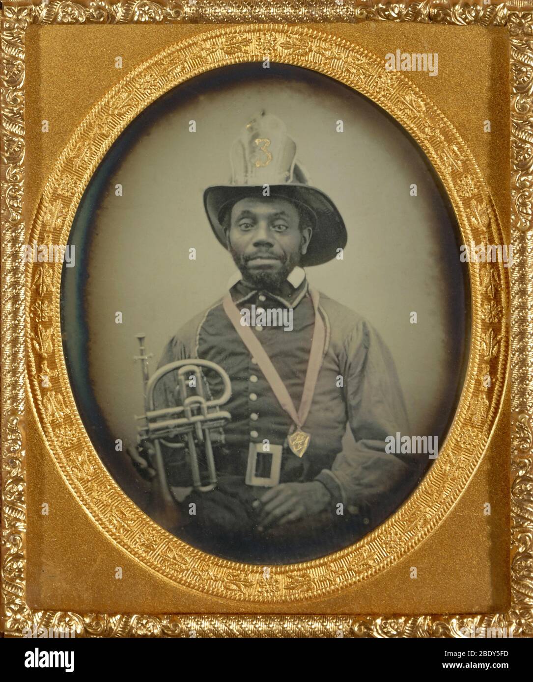 Black Fireman Holding Musical Instrument, 1855 Stock Photo