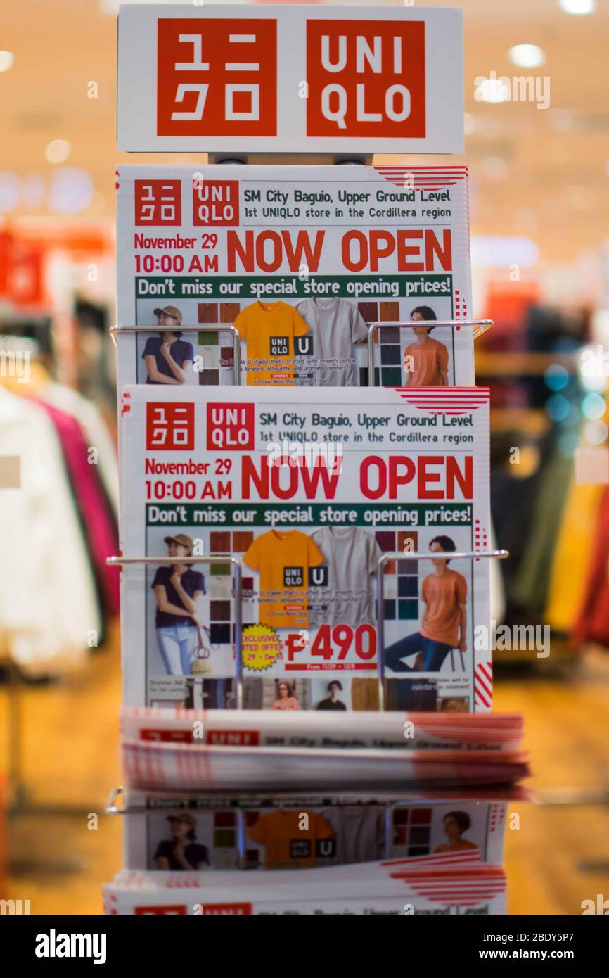 NOV. 28, 2019-BAGUIO CITY PHILIPPIINES : Newly open UNIQLO store inside SM  Baguio City mall. Promotional leaflet on a stand outside the newly openned  Stock Photo - Alamy