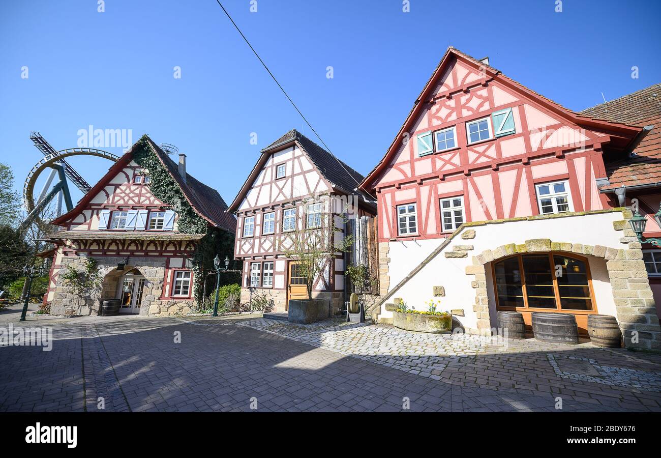 07 April 2020, Baden-Wuerttemberg, Cleebronn: The village street in the empty amusement park Tripsdrill. During the easter holidays the park is actually very well visited. To slow down the spread of the coronavirus, amusement parks are also closed. Photo: Sebastian Gollnow/dpa Stock Photo