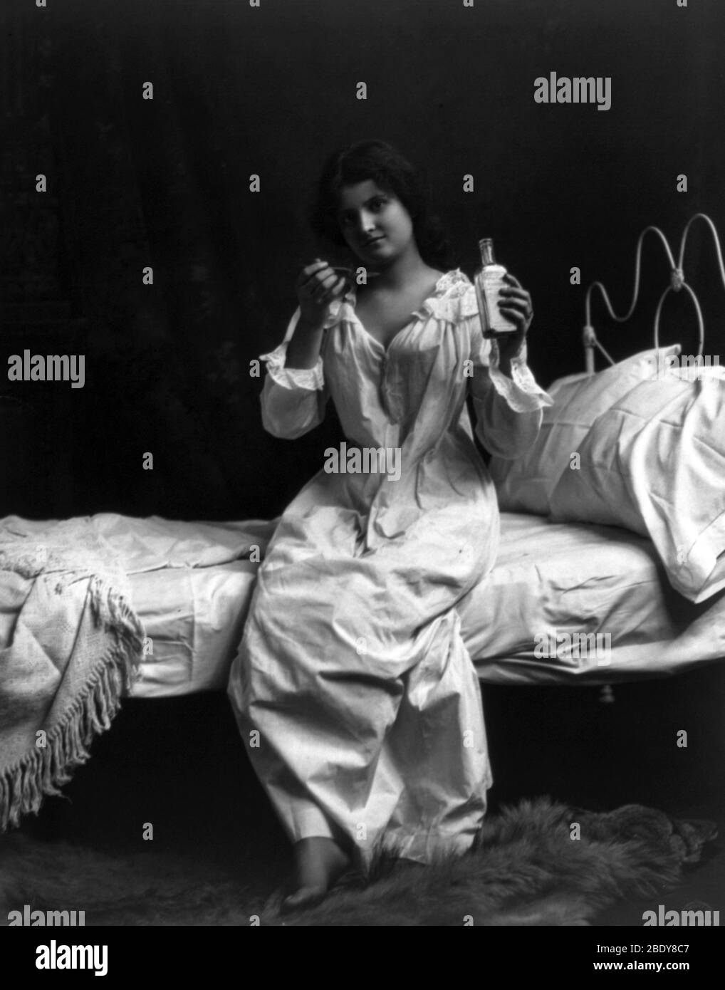 Spoonful of Medicine, 1901 Stock Photo