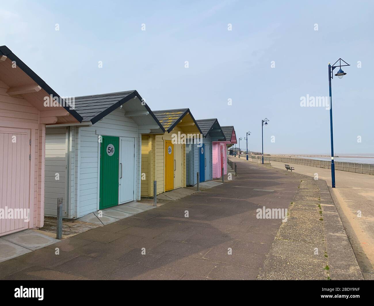 Mablethorpe, Lincolnshire,  UK. 10th April 2020. The deserted South Beach seaside promenade and beach huts of Mablethorpe, usually full of day trippers on a Good Friday. Credit: Tim Ring/Alamy Live News Stock Photo