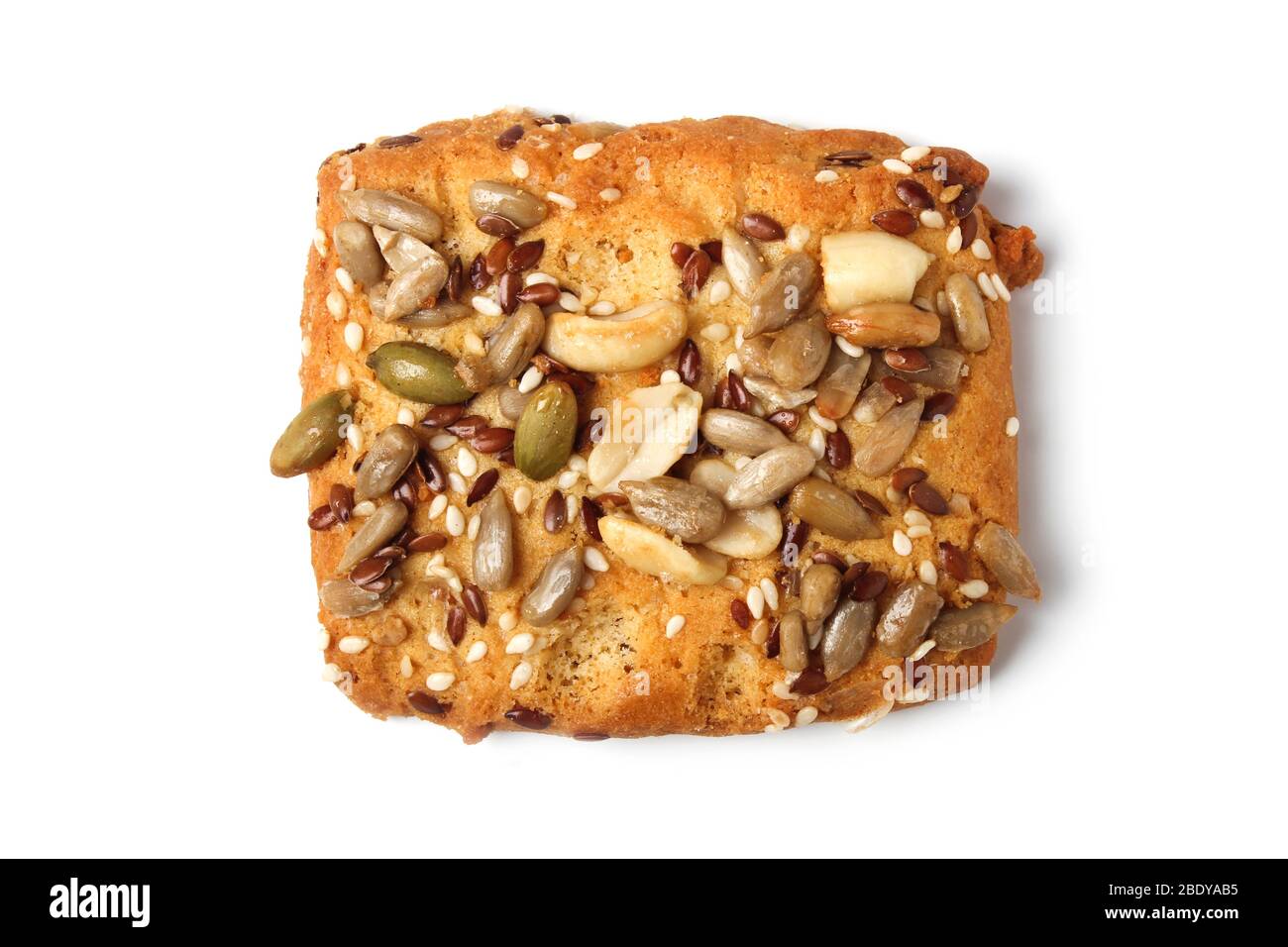 Cookie with nuts, seeds and sesame isolated on white background Stock