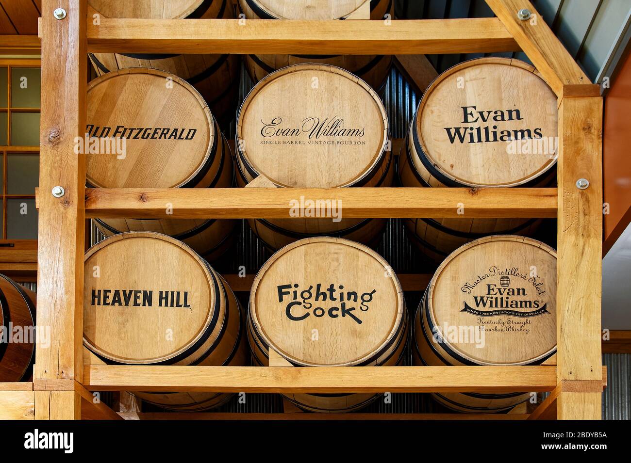 old whiskey barrels display, distillery names printed, Heaven Hill