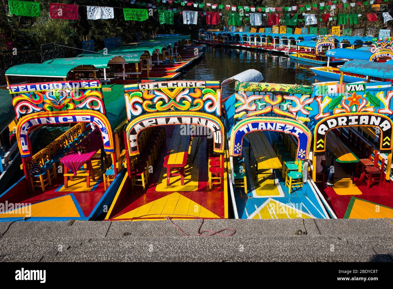 Colorful boats on the canals of Xochimilco in Mexico City, Mexico Stock Photo