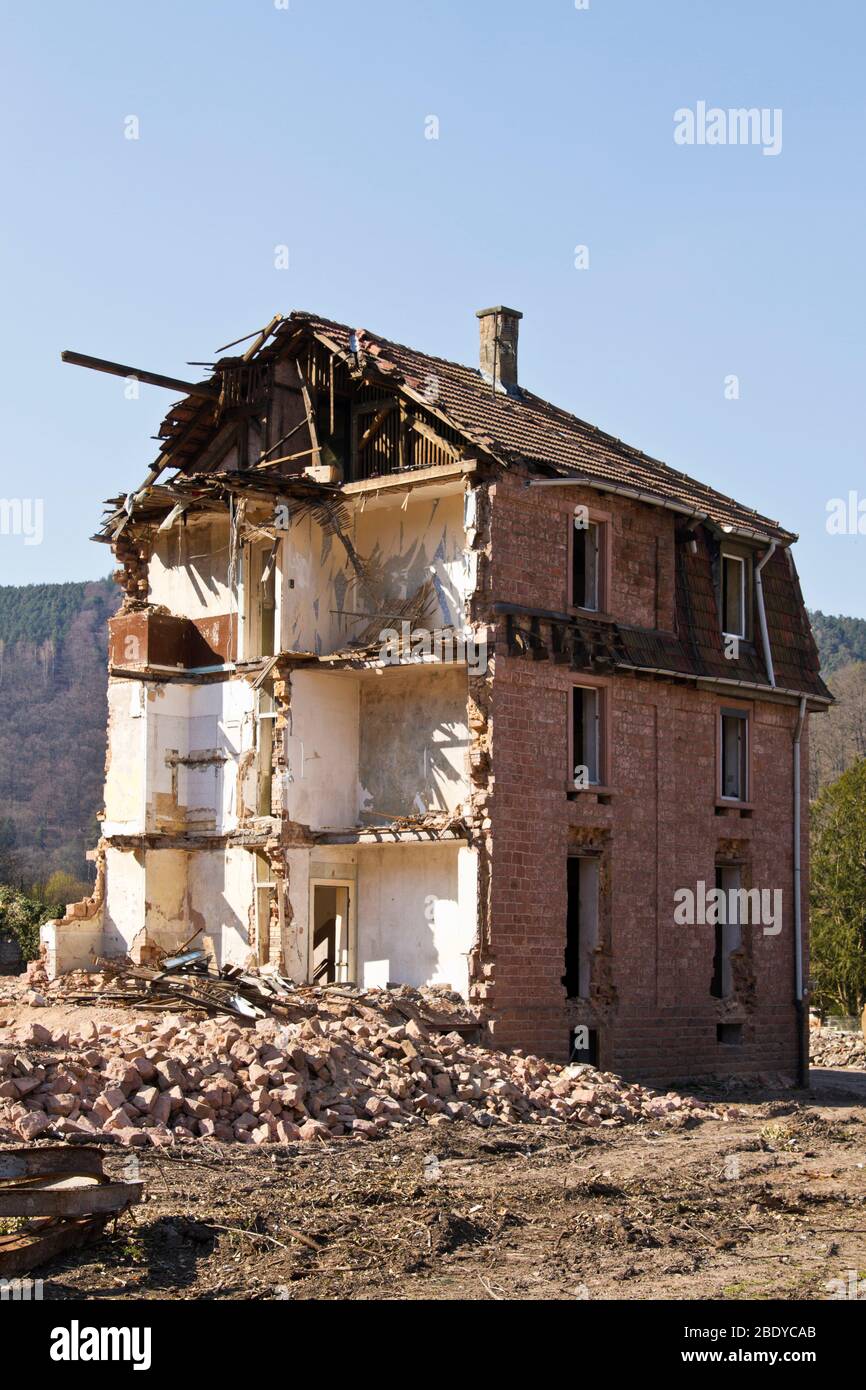 Demolished building - part of the house ist still standing Stock Photo
