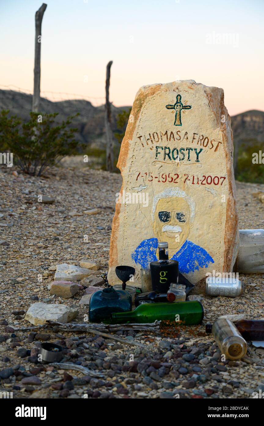 This humorous headstone has a drawing of the person buried here in the Terlingua Cemetery in West Texas, where the graves are marked by handmade embel Stock Photo