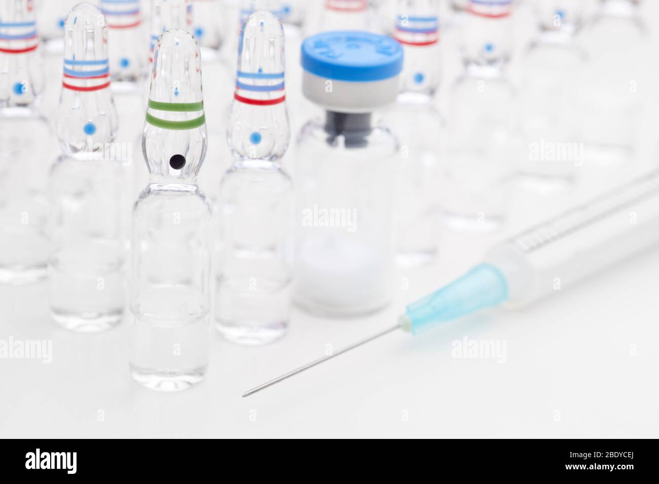 Medical ampoules and syringe for vaccination or beauty treatment - selective focus Stock Photo