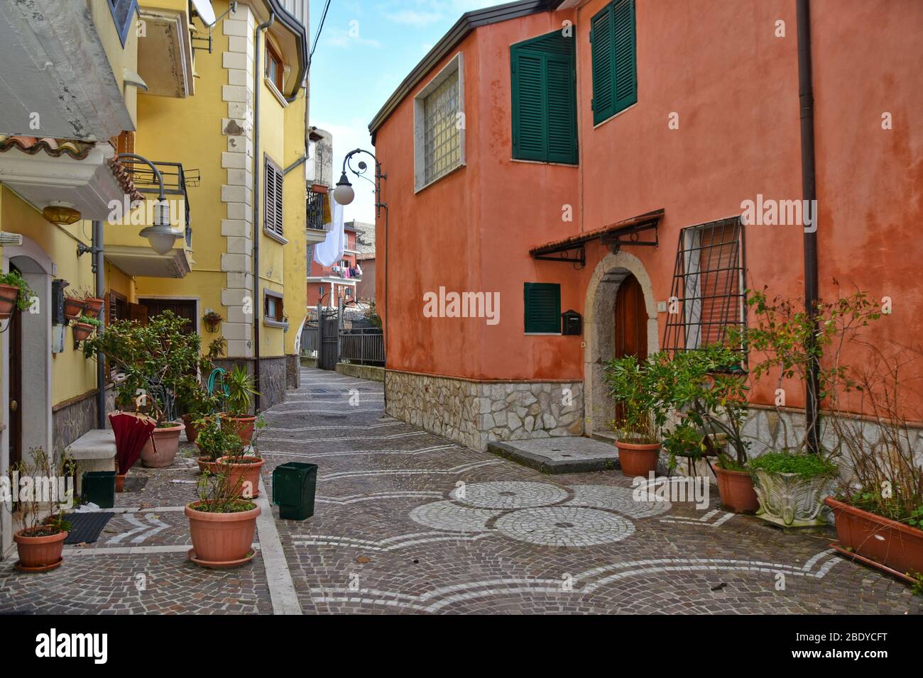 A narrow street between the houses of Monteverde, a town in the province of Avellino, Italy Stock Photo