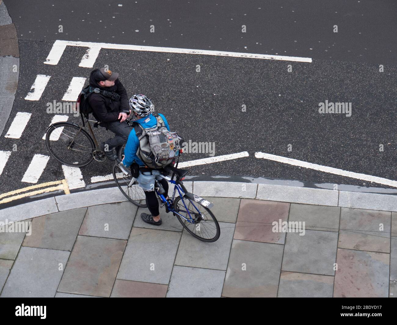 Bicycle, cycle messengers in Central London, talking at a road junction