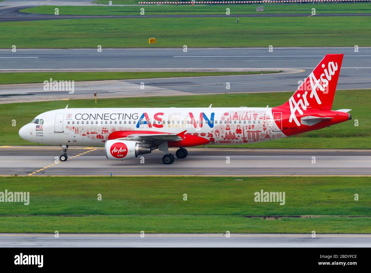 Changi, Singapore – January 29, 2018: Air Asia Airbus A320 airplane at Changi airport (SIN) in Singapore. Airbus is a European aircraft manufacturer b Stock Photo