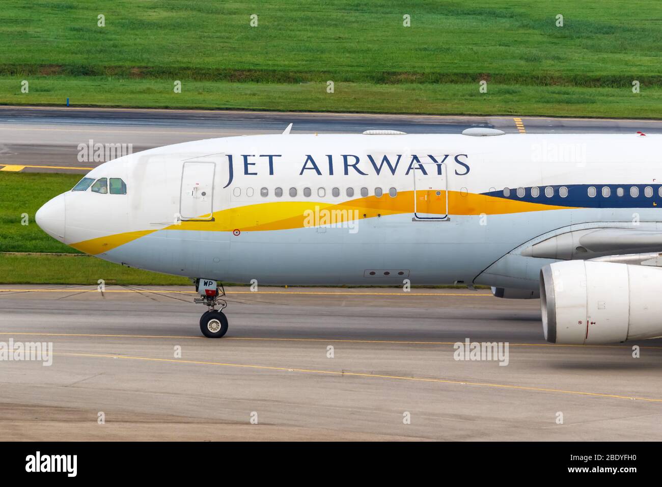 Changi, Singapore – January 29, 2018: Jet Airways Airbus A330-200 airplane at Changi airport (SIN) in Singapore. Airbus is a European aircraft manufac Stock Photo