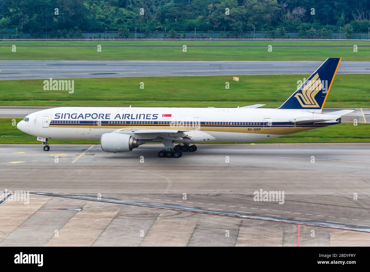 Changi, Singapore – January 29, 2018: Singapore Airlines Boeing 777-200ER airplane at Changi airport (SIN) in Singapore. Boeing is an American aircraf Stock Photo