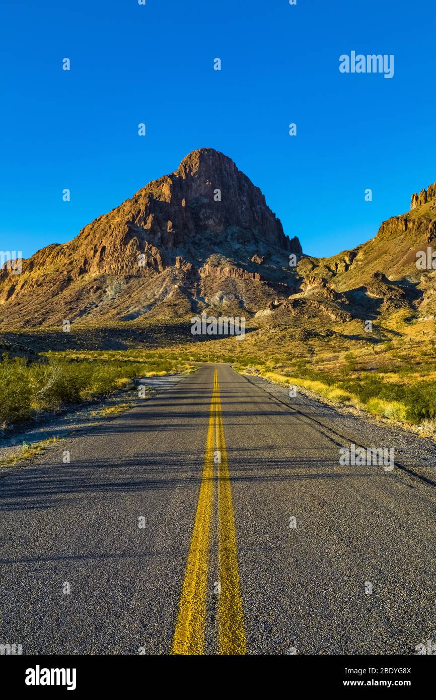 Driving Historic Route 66 toward Boundary Cone and Oatman (the pointed peak here) along Historic