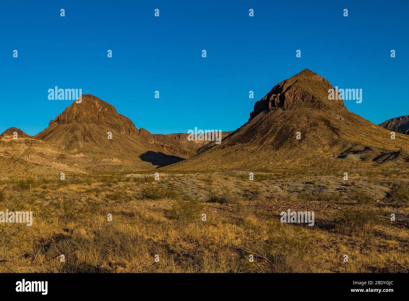 Driving Historic Route 66 toward Boundary Cone and Oatman (the pointed peak here) along Historic